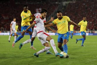 two footballers clashing